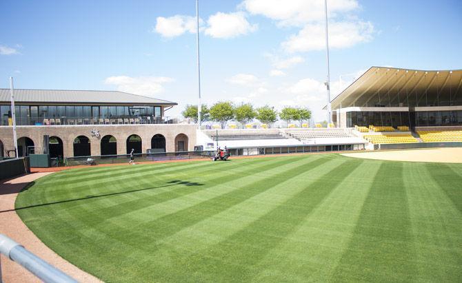 The groundskeepers mow the field at Tiger Park&#160;on Tuesday, March 20, 2018.