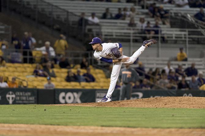 LSU junior pitcher Cam Sanders (49) pitches the ball during LSU&#8217;s 9-3 victory over University of Tennessee in Alex Box Stadium on Friday, April 13, 2018.