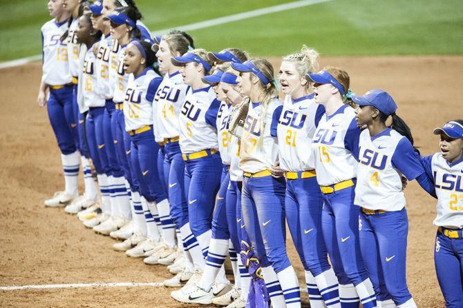 The LSU softball team sings the alma mater during LSU&#8217;s 2-0 victory over Texas A&amp;M on Friday, April 20, 2018, at Tiger Park.