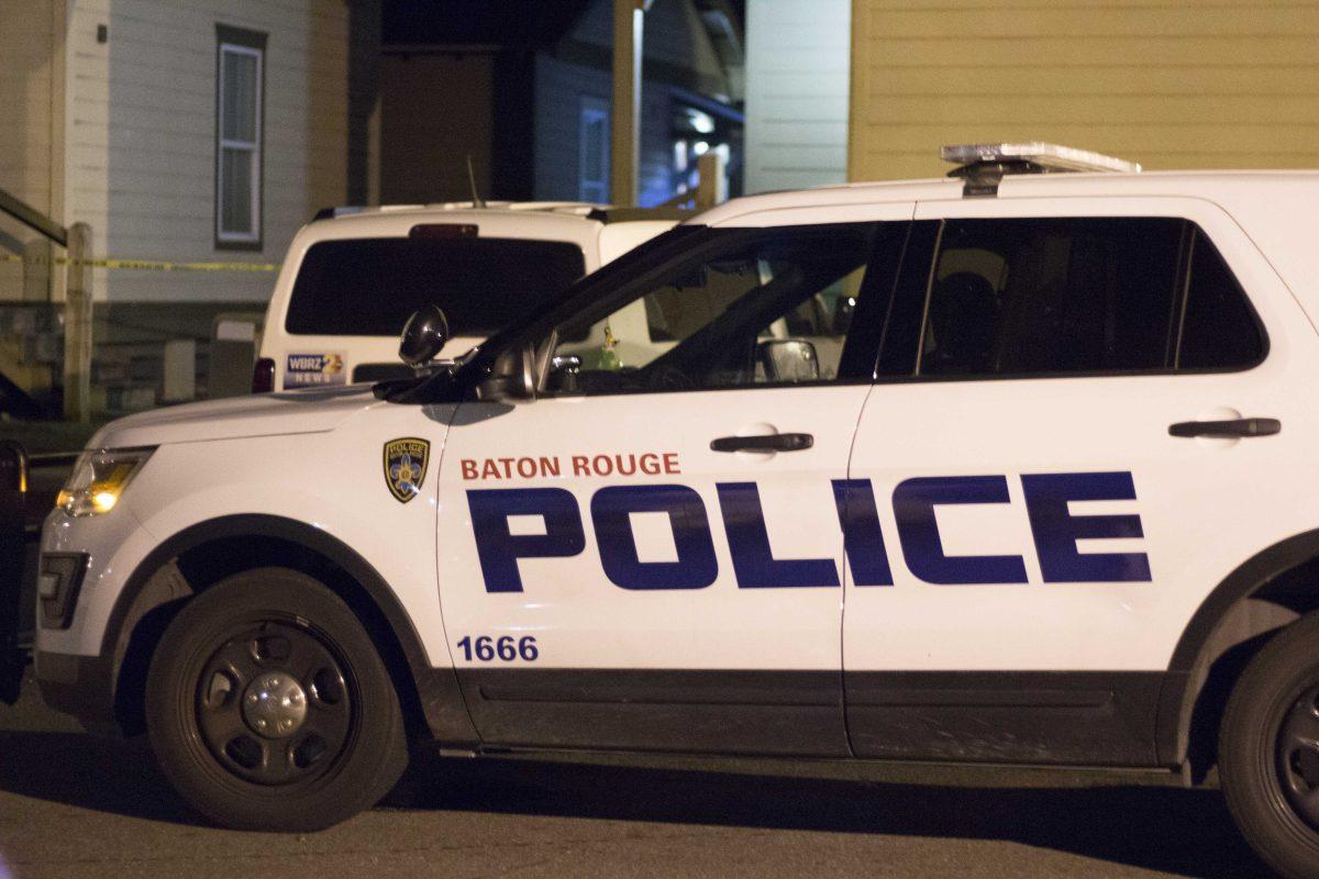 A Baton Rouge Police car sits outside "The Lodges at 777" located on 777 Ben Hur Road, on Nov. 8, 2017.