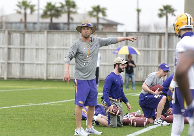 LSU offensive coordinator Matt Canada directs offensive players during the first spring football practice on Saturday, March 11, 2017 at the Charles McClendon LSU football practice facility.