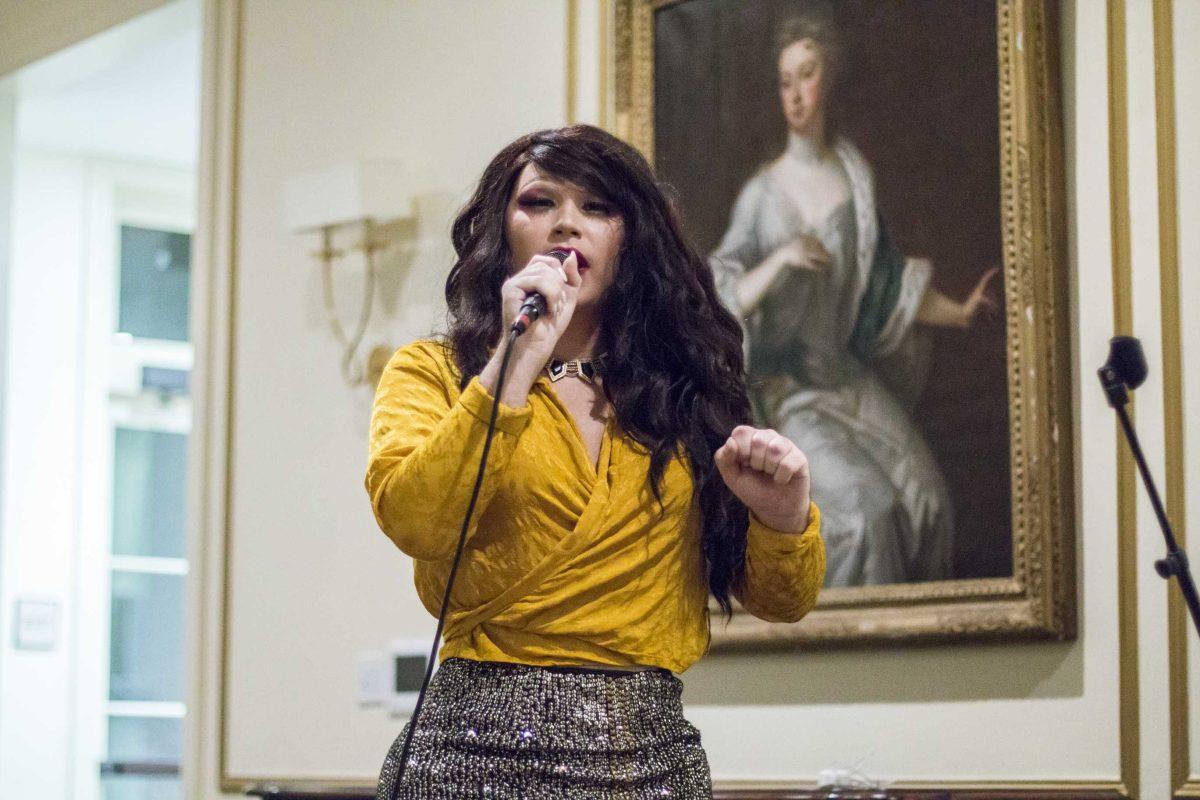 Drag queen Carina Von Tuna speaks at LAQC's Queer After Party in the LSU French House on Saturday, April 14, 2018.