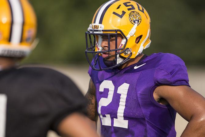 LSU junior cornerback Ed Paris (21) after running through a drill during an outdoor practice on Tuesday Sept. 27, 2016, on the LSU footbal practice fields at the LSU Football Practice and Training Facilities.