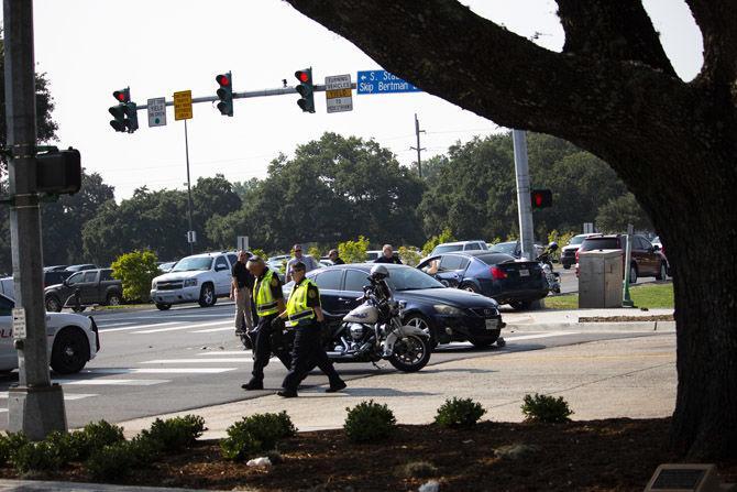 LSU students struck by car pushed onto sidewalk near Nicholson Drive, driver cited