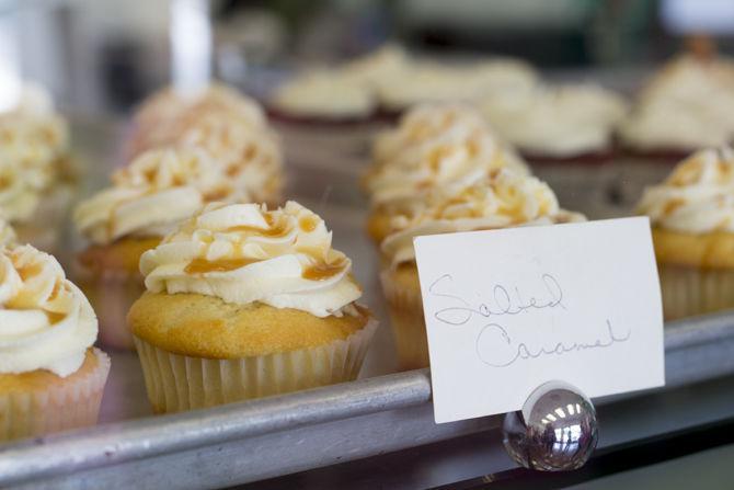 Cupcakes sit on display at the one year anniversary of Cupcake Junkie on Coursey Blvd. on Saturday, Aug. 25, 2018.