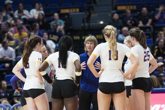 Coach Fran Flory speaks to her players during the Lady Tigers' 3-1 victory over Auburn University on Wednesday, Nov. 15, 2017, in the Pete Maravich Assembly Center.