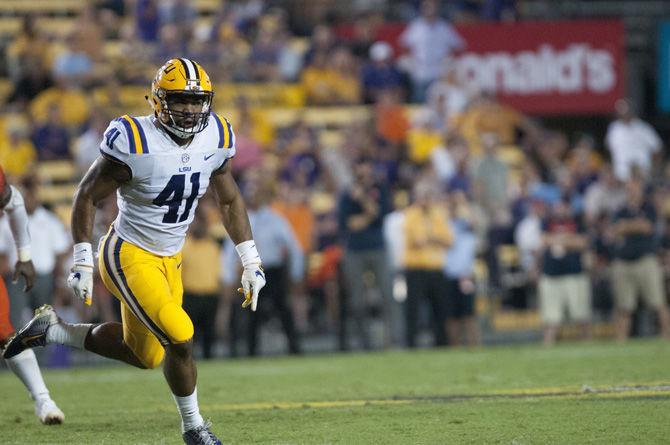 LSU junior fullback/tight end David Ducre (41) runs onto the field during the Tigers' 35-26 win against Syracuse on Saturday, Sept. 23, 2017.