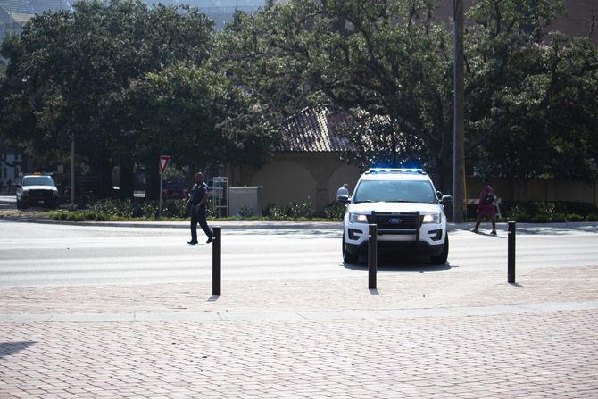 LSU students struck by car pushed onto sidewalk near Nicholson Drive, driver cited