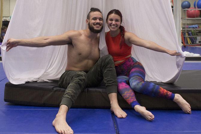 LSU public relations junior Allyson Huval and theatre junior Chase Bell practice aeriel silks as part of the Physical Theatre Club in the Music and Dramatic Arts building on Monday, Aug. 27, 2018.