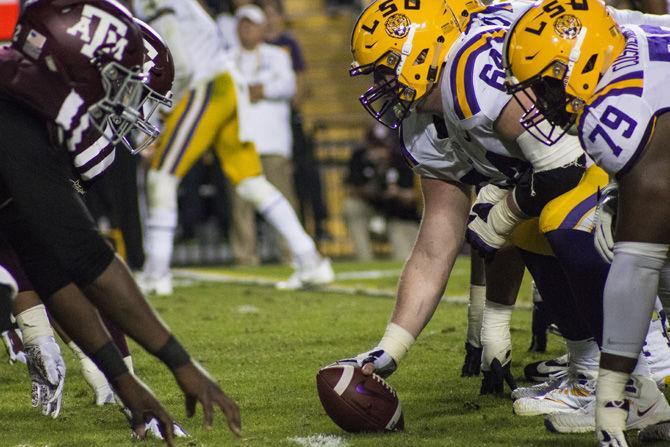 LSU football players line up for a play during the Tigers' 20-7 lead against Texas A &amp; M in Tiger Stadium on Nov. 25, 2017.