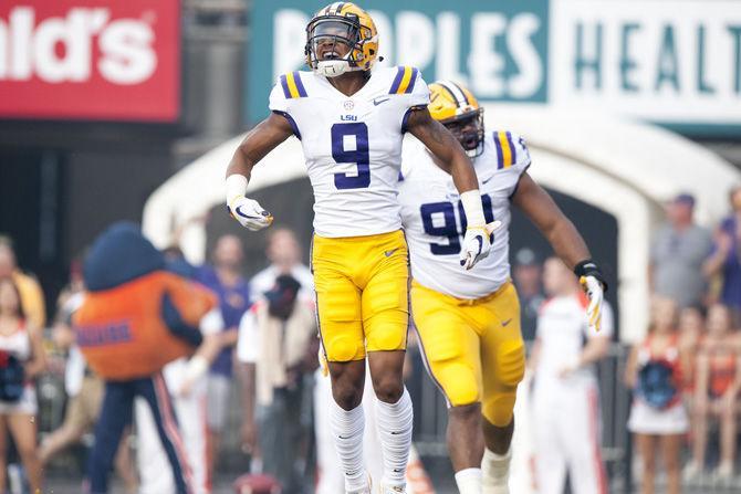 LSU freshman safety Grant Delpit (9) celebrates during the Tigers' 35-26 win against Syracuse on Saturday, Sept. 23, 2017, in Tiger Stadium.