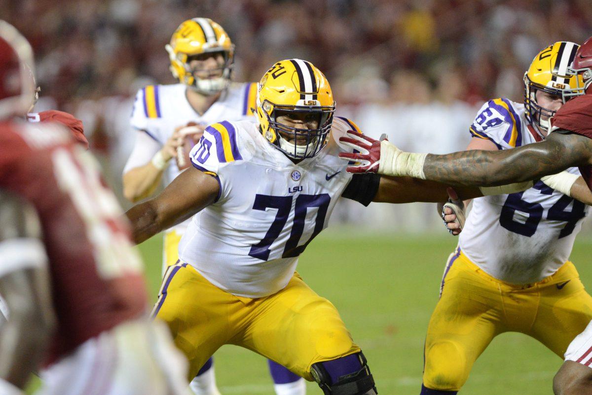 LSU freshman offensive guard Ed Ingram (70) holds back two Alabama defenders during the Tigers' 24-10 loss against Alabama on Nov. 4, 2017, at Bryant-Denny Stadium.