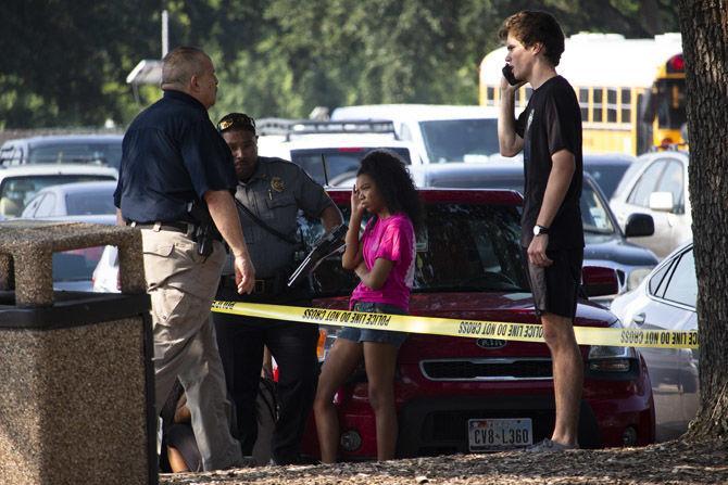 LSU students struck by car pushed onto sidewalk near Nicholson Drive, driver cited