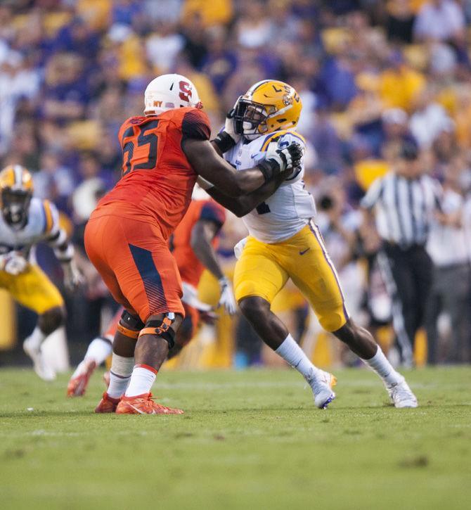 LSU freshman linebacker Tyler Taylor (24) attempts to tackle on Saturday, Sept. 23, 2017, during the LSU game against Syracuse.