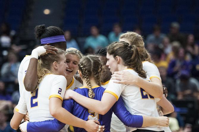 <p>The Lady Tigers huddle before the game during their 3-1 victory over Auburn University on Wednesday, Nov. 15, 2017, in the Pete Maravich Assembly Center.</p>