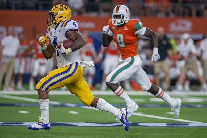 LSU senior running back Nick Brossette (4) runs in a touchdown during the Tigers' 33-17 victory over Miami in the AdvoCare Classic on Sunday, Sept. 2, 2018 at AT&amp;T Stadium in Arlington, Texas.