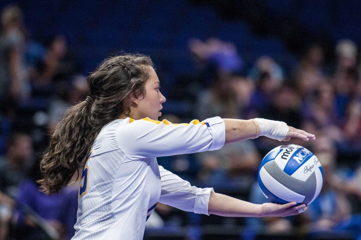 LSU freshman defensive specialist Leigh Maher (15) prepares to serve the ball during the Lady Tigers' 1-3 loss in the PMAC against Duke on Friday, Aug. 31, 2018.