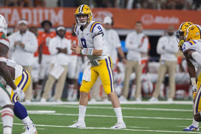 LSU junior quarterback Joe Burrow (9) prepares for a play during the Tigers' 33-17 victory over Miami in the AdvoCare Classic on Sunday, Sept. 2, 2018 at AT&amp;T Stadium in Arlington, Texas.