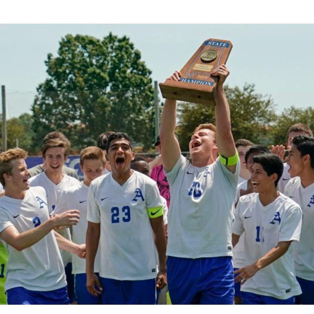 Avery Atkins celebrates with his teammates at Auburn High School after winning the Alabama 7A State Soccer Championship in 2018.