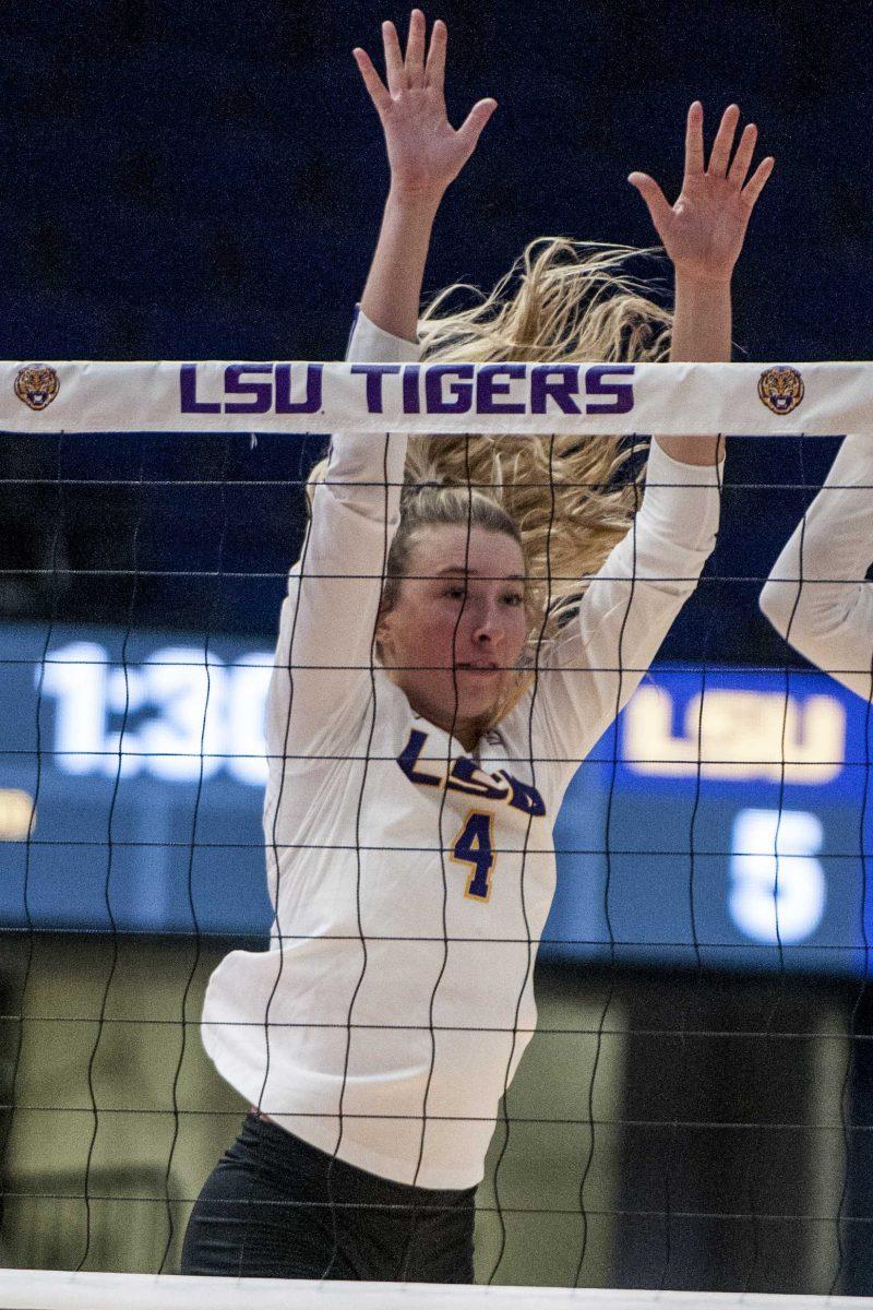 LSU freshman middle blocker Whitney Foreman (4) attempts to block the ball during the Lady Tigers' 1-3 loss in the PMAC against Duke on Friday, Aug. 31, 2018.