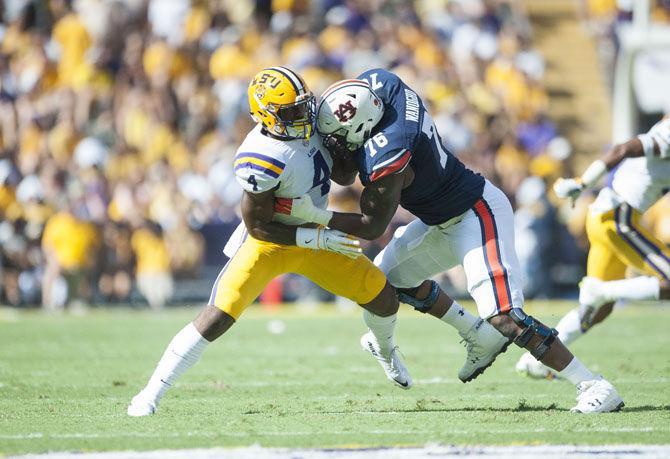 LSU freshman linebacker K&#8217;Lavon Chaisson (4) plays defense during the Tigers' 27-23 victory against Auburn on Saturday, Oct. 14, 2017, in Tiger Stadium.