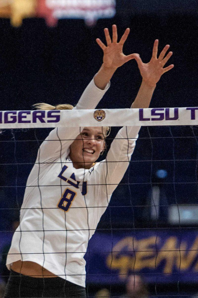 LSU senior middle blocker Olivia Beyer (8) attempts to block the ball during the Lady Tigers' 1-3 loss in the PMAC against Duke on Friday, Aug. 31, 2018.