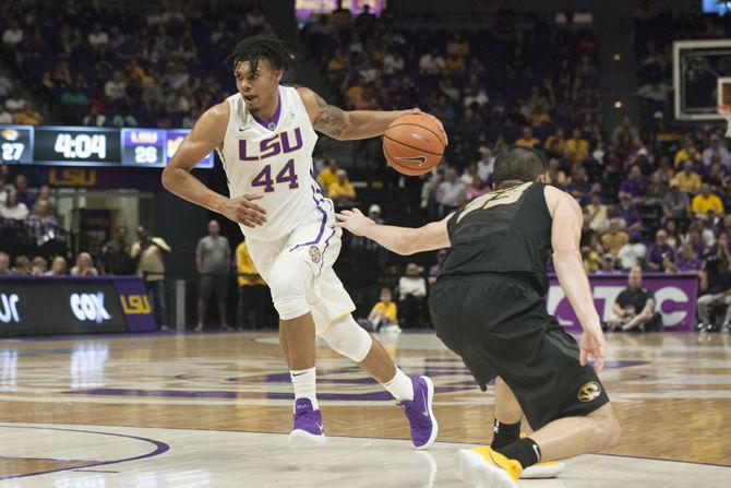 LSU sophomore forward Wayde Sims (44) dribbles the ball during the Tigers' 64-63 victory against Missouri on Saturday, Feb. 17, 2018 in the PMAC.