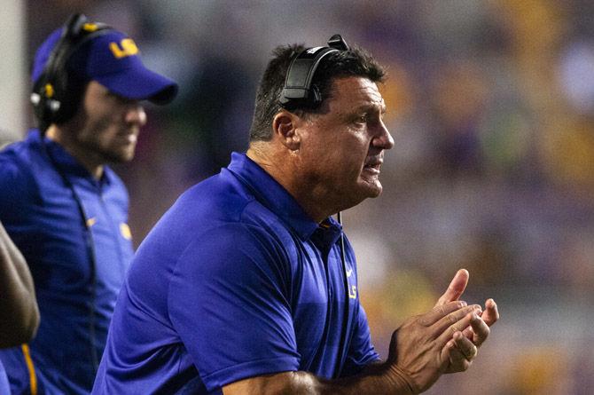 Head coach Ed Orgeron cheers for his players during the Tigers&#8217; 31-0 victory over Southeastern on Saturday, Sept. 8, 2018, in Tiger Stadium.