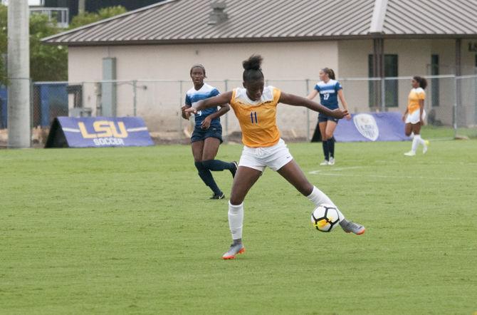 LSU sophomore forward Tinaya Alexander (11) dribbles the ball during the Tigers' 2-0 win over the Samford Bulldogs on Sunday, Sept. 9, 2018, at the LSU Soccer Complex.