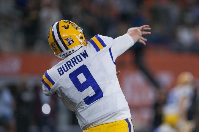 LSU junior quarterback Joe Burrow (9) throws the ball during the Tigers' 33-17 victory over Miami in the AdvoCare Classic on Sunday, Sept. 2, 2018 at AT&amp;T Stadium in Arlington, Texas.