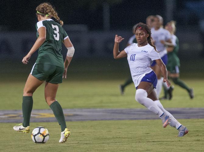 LSU sophomore forward Adrienne Richardson (10) runs toward Stetson's defender Claire Morrison (3) during the Tigers' 2-0 win over the Stetson Hatter's on Thursday, Sept. 6, 2018, at the LSU Soccer Complex.