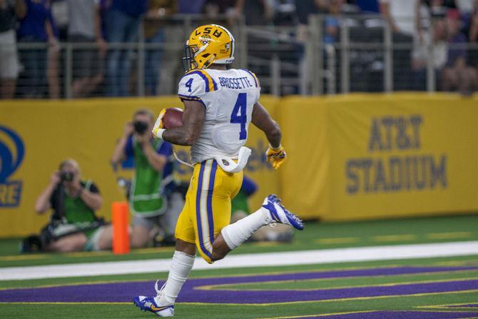 LSU senior running back Nick Brossette (4) runs in a touchdown during the Tigers' 33-17 victory over Miami in the AdvoCare Classic on Sunday, Sept. 2, 2018 at AT&amp;T Stadium in Arlington, Texas.