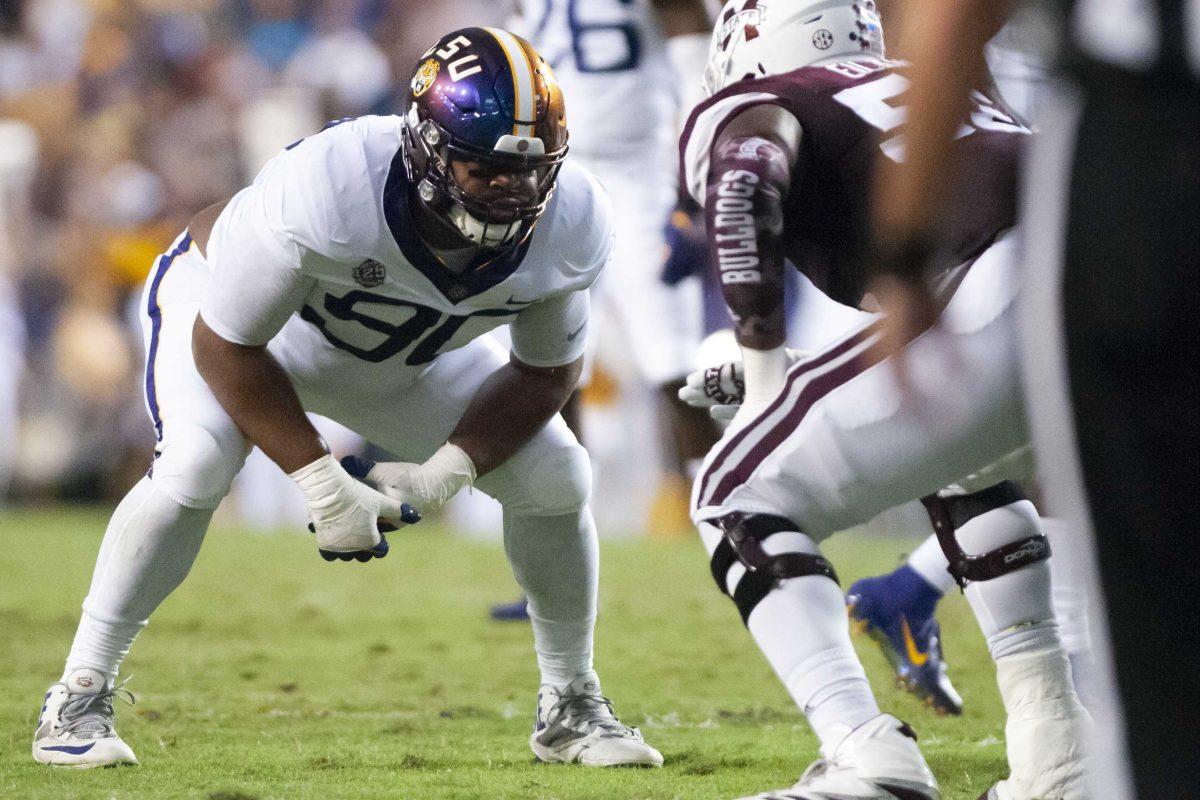 LSU junior defensive end Rashard Lawrence (90) prepares for a play during the Tigers&#8217; 19-3 victory over Mississippi State on Saturday, Oct. 20, 2018, in Tiger Stadium.