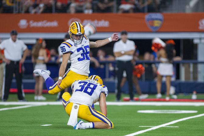 LSU sophomore placekicker Cole Tracy (36) kicks the ball during the Tigers' 33-17 victory against Miami in the AdvoCare Classic on Sunday, Sept. 2, 2018 in AT&amp;T Stadium in Arlington, Texas.