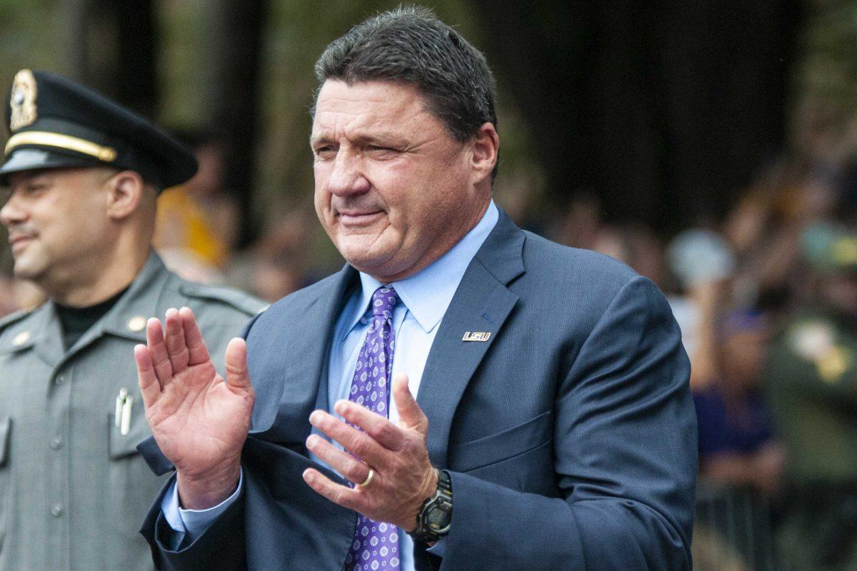 Coach Ed Orgeron marches down Victory Hill before the LSU football game against Mississippi State on Saturday, Oct. 20, 2018.