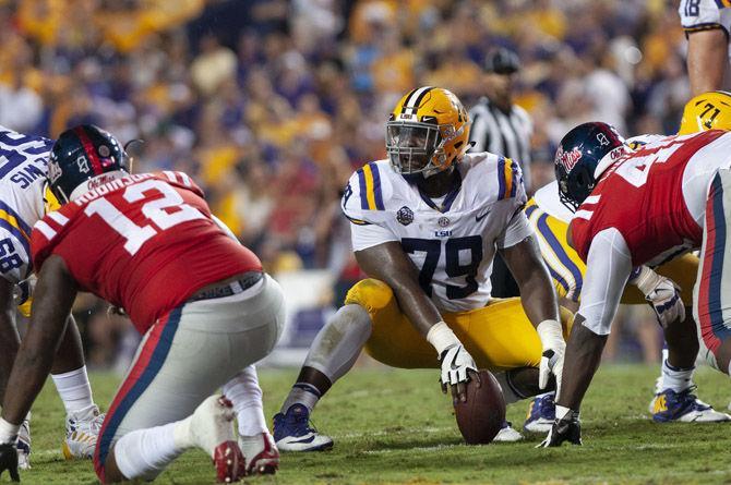 LSU sophomore center Lloyd Cushenberry III (79) prepares to snap the ball during the Tigers' 45-16 victory over Ole Miss in Tiger Stadium on Saturday, Sept. 29, 2018.