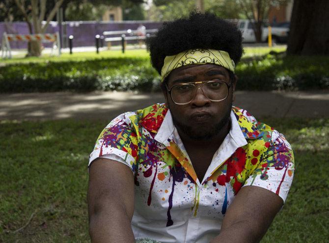 LSU communication studies freshman Calvin Morris sits in front of Foster Hall on Monday, Oct. 15, 2018.