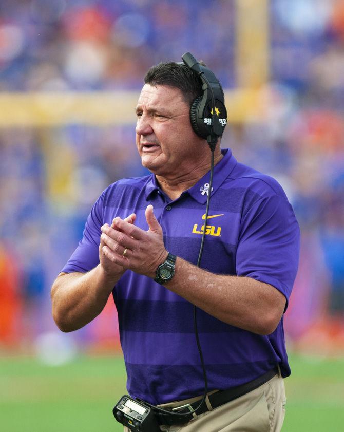 LSU Head Coach Ed Orgeron cheers his team on during the Tigers&#8217; 27-19 loss against the University of Florida on Saturday, Sept. 2018 in Ben Hill Griffin Stadium.