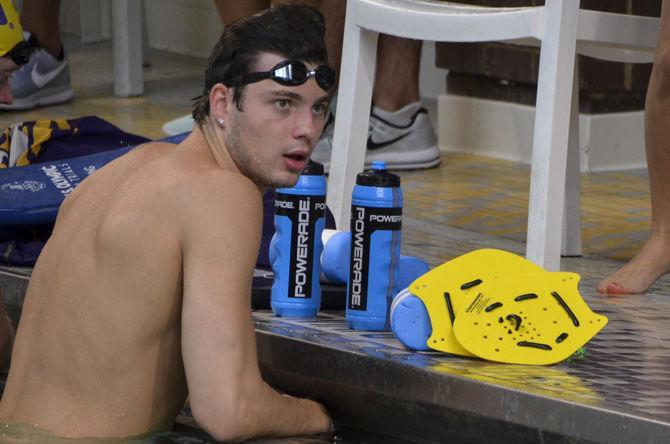 LSU sophomore swimmer Matt Klotz takes a break during practice on Tuesday, Aug. 29, 2017, at the UREC.