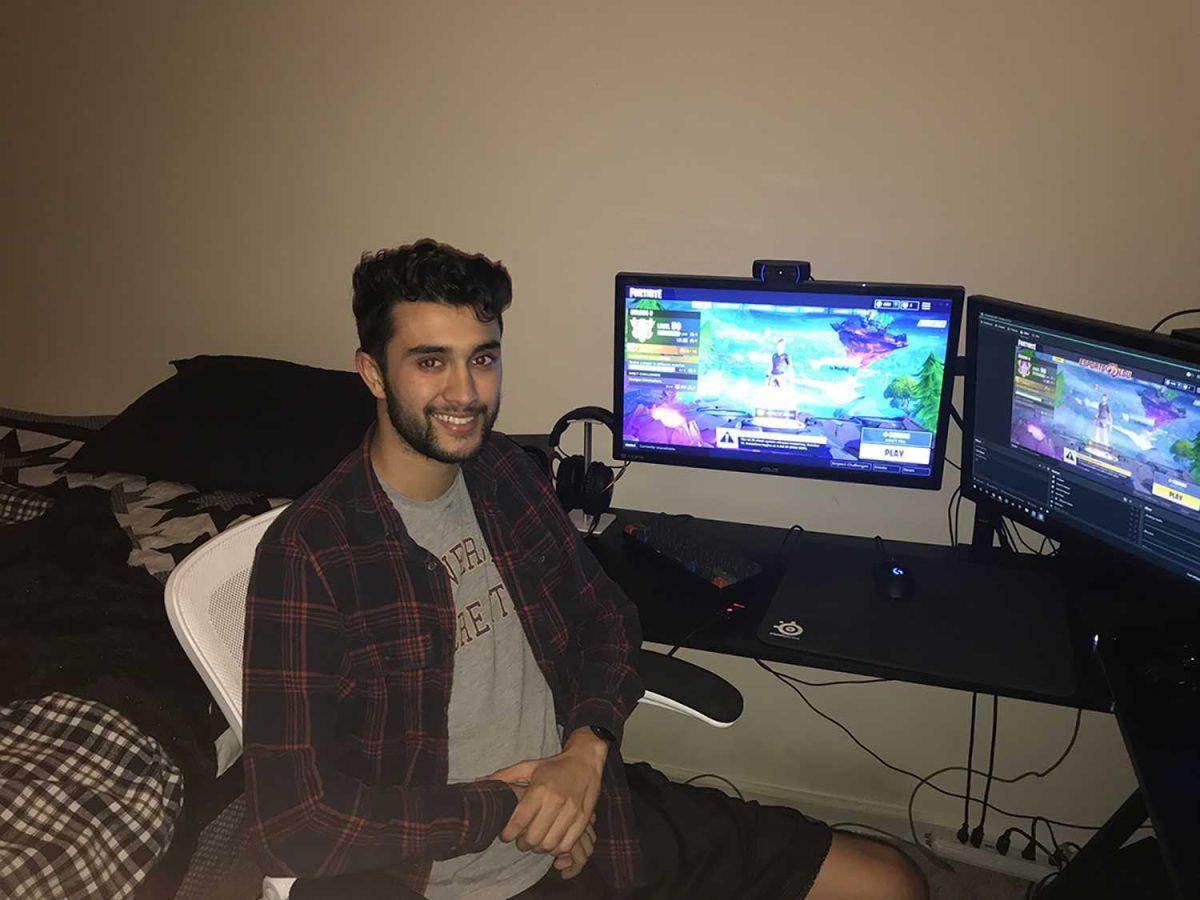 Computer science junior Matt Landry pays Fortnite in his apartment on Oct. 15, 2018.