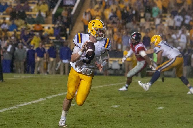 LSU junior quarterback Joe Burrow (9) looks to through the ball down field during the Tigers&#8217; 45-16 victory over Ole Miss on Saturday Sept. 29, 2018, in Tiger Stadium.