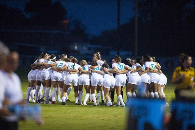 The LSU women&#8217;s soccer team huddle up before the Tigers' 2-0 win over Alabama on Thursday, Sept. 27, 2018, at the LSU Soccer Complex.