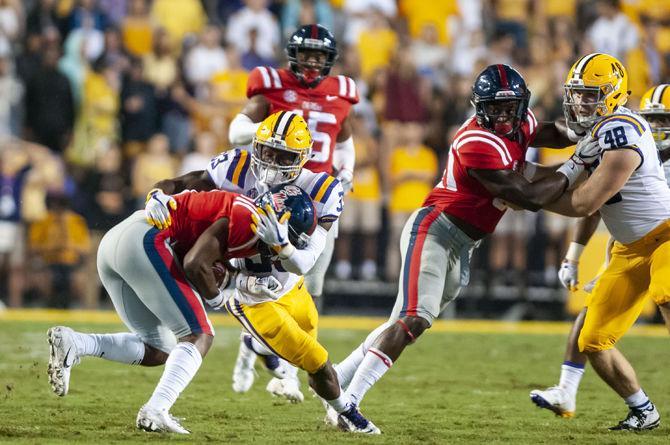 LSU sophomore safety Todd Harris (33) makes a tackle during the Tigers&#8217; 45-16 victory over Ole Miss on Saturday Sept. 29, 2018, in Tiger Stadium.