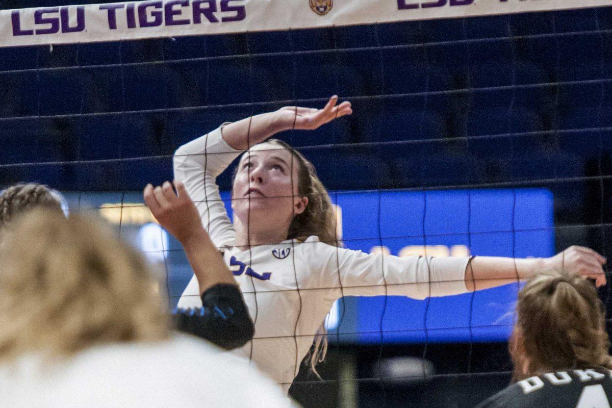 LSU freshman middle blocker Whitney Foreman (4) jumps to spike the ball during the Lady Tigers' 1-3 loss in the PMAC against Duke on Friday, Aug. 31, 2018.