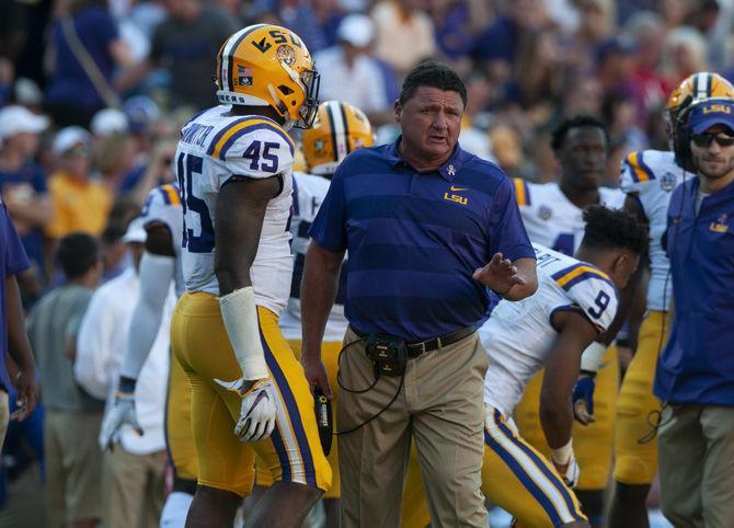 LSU Football Coach Ed Orgeron calls a play from the sidelines during the Tigers' 36-16 victory against Georgia&#160;at Tiger Stadium on Saturday, Oct. 13, 2018.