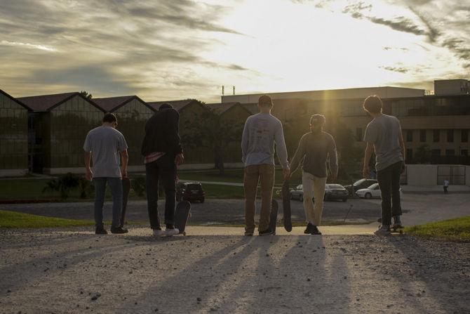 The LSU skate group prepares to ride down a hill on campus on Friday, Oct. 26, 2018.