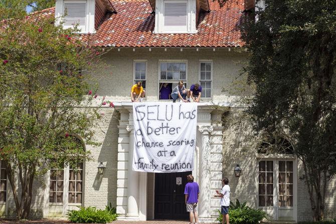 The Delta Kappa Epsilon fraternity at LSU hangs a banner on Saturday, Sept. 8, 2018.