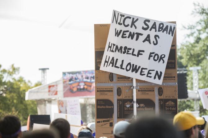 Tiger fans make signs mocking Alabama head football coach Nick Saban during the College GameDay event on Saturday Nov 5, 2016, in the Quadrangle on LSU campus.