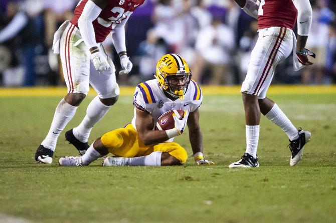 LSU senior running back Nick Brossette (4) catches a pass during the Tigers' 29-0 loss against Alabama on Saturday, Nov. 3, 2018, in Tiger Stadium.