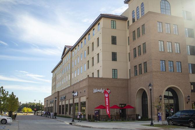 Nicholson Gateway Apartments sit between West Chimes Street and Skip Bertman Drive on Sunday, Oct. 21, 2018.